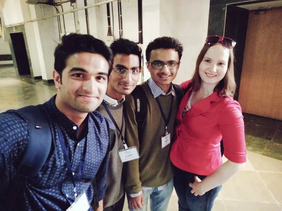 Nell Watson with a crowd of smiling students at IIT Bombay